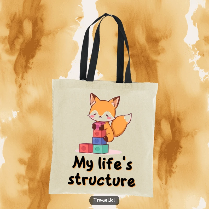 Funny fox tote bag showing a playful character carefully stacking colorful blocks, perfect for carrying essentials with a smile.